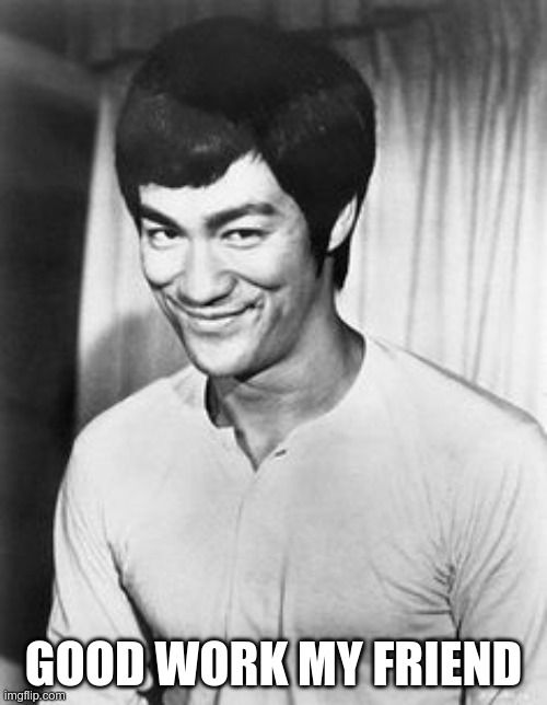 Bruce Lee smiling with the caption 'Good work my friend'