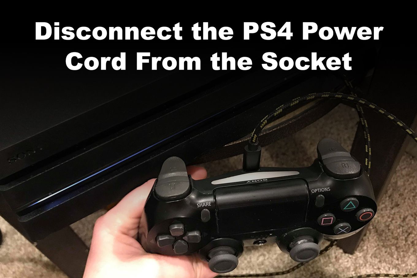 A PS4 console connected to a power source