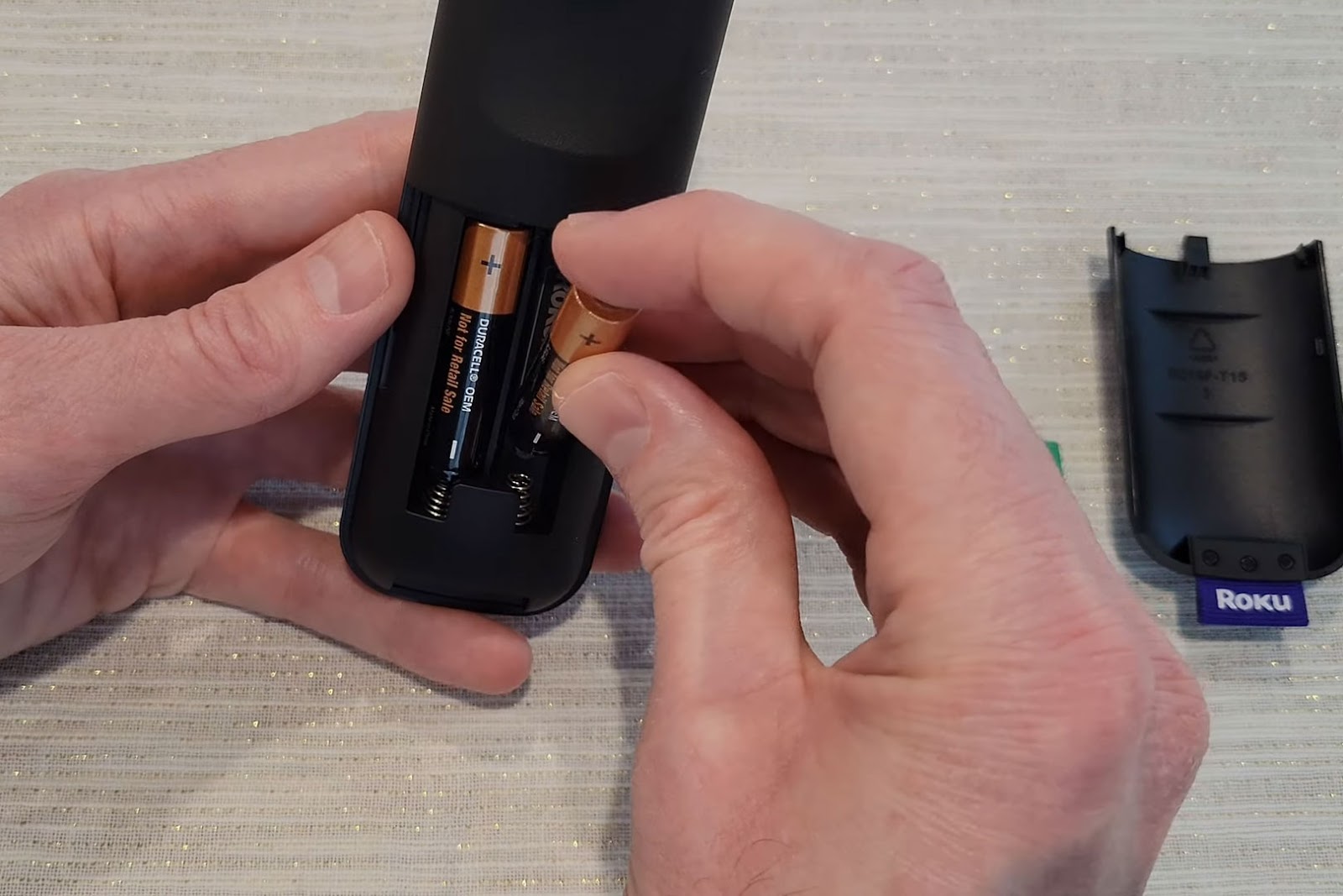 Place the Batteries on the Hisense Roku Remote